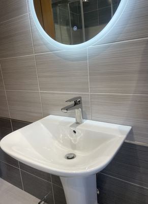New basin, tap and light-up mirror