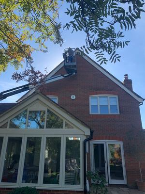 Fascias being restored from a cherry picker